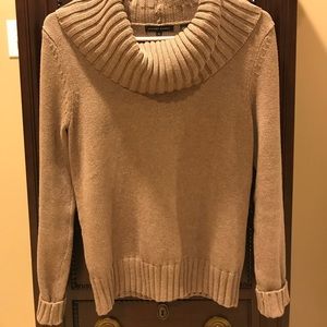 Small light brown turtleneck sweater